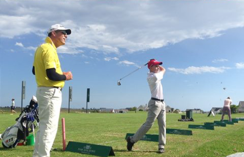 Students were eager to get back into the program and it did not take long before they were on the KeNako green participating in a short game assessment tests with academy Coach Carlo Kok and working on their irons and long game with Head Coach Roger Wessels. The School Leaver students at KeNako Academy enjoy morning golf and training sessions and their afternoons are mostly dedicated to practicing any changes in their swings/strokes or playing at one of the local courses. The school goers attend Rundle College each morning and then participate in the golf program every afternoon from 13h00. The picture shows Roger Wessels on the range with young Vuk Ranković from Serbia.